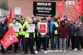 Caterpillar NI employees and Unite union members form a picket at the company's west Belfast plant on April 11. It was revealed last week by Unite the Union that Lisburn and Castlereagh council workers intend to stage a strike after talks about a pay increase failed. Picture: Jonathan Porter/PressEye