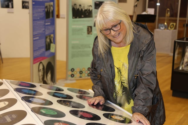Helena Alcorn Espie browses some of the items on display in the new exhibition, ‘Let Me Introduce You: A History of Dance Halls in the Causeway Area’, which is now open in Coleraine Town Hall
