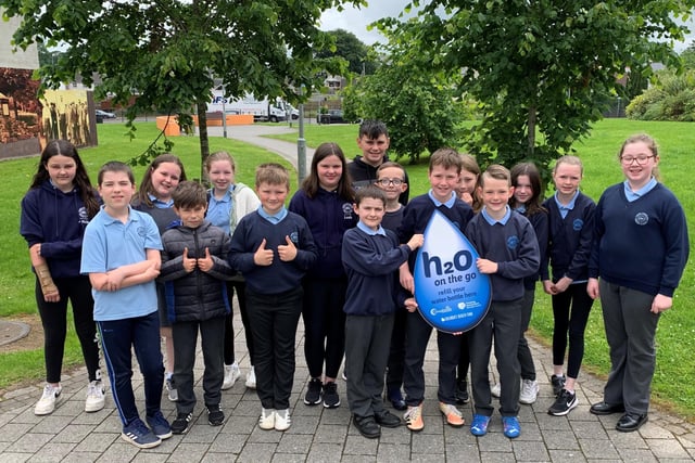 Primary 6 and 7 pupils from Carhill Integrated Primary School prepare for their environmental mission along Main Street in Garvagh