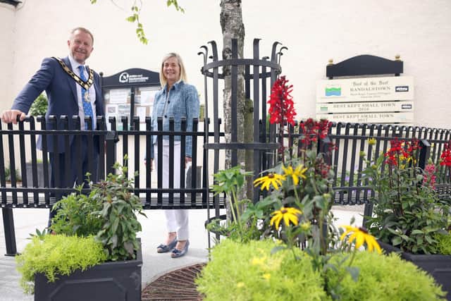 Mayor of Antrim and Newtownabbey, Alderman Stephen Ross with Helen Boyd, Chair of the Tidy Randalstown pictured at the new seating area in the town's centre