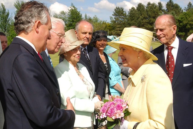 The Queen pictured chatting with then Secretary of State Peter Hain and First Minister Ian Paisley during the garden party at Coleraine University in 2007 Photo by Simon Graham/Harrison Photography