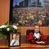 Mayor of Antrim and Newtownabbey, Ald Stephen Ross signing the online book of condolence.
