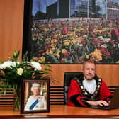 Mayor of Antrim and Newtownabbey, Ald Stephen Ross signing the online book of condolence.