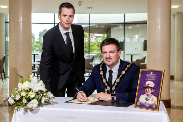 Mayor, Councillor Scott Carson has officially opened the council's Books of Condolence for The Queen. (Credit: Lisburn and Castlereagh City Council Facebook)