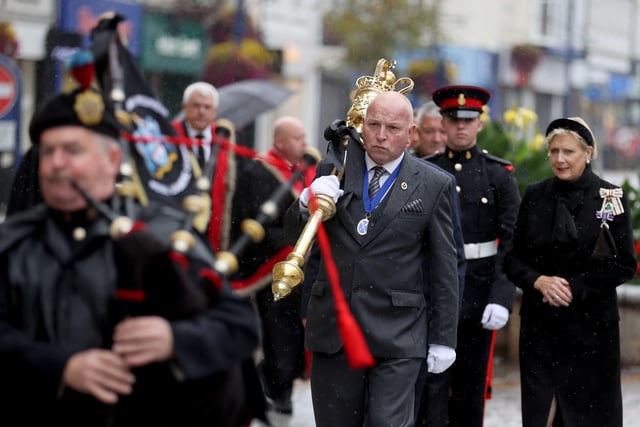 Pipers and Mace Bearer Alan Moffett lead the procession ahead of the Accession Proclamation for County Londonderry held at Coleraine Town Hall