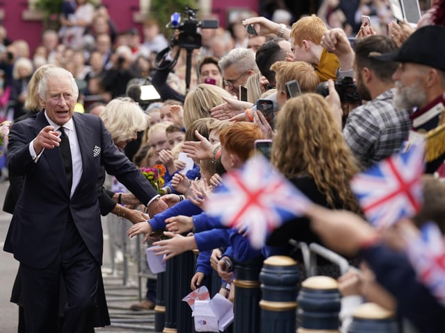 King Charles III meeting wellwishers as he arrives for a visit to Hillsborough Castle, Co Down, following the death Queen Elizabeth II on Thursday. Picture date: Tuesday September 13, 2022.