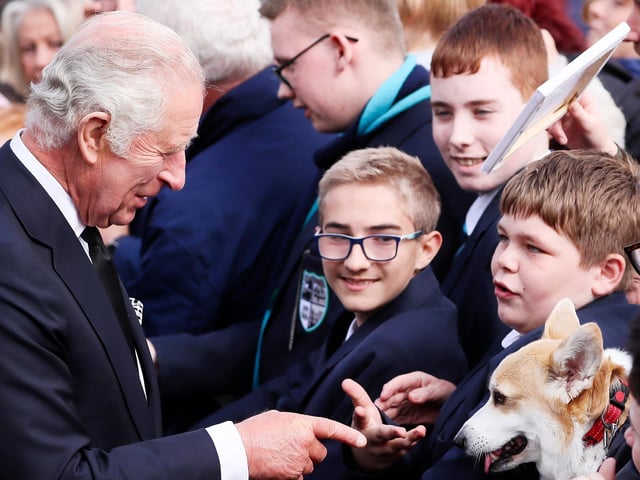 Press Eye - Belfast - Northern Ireland -  13th September 2022Members of the public, local school children and Connie the Corgi meet King Charles at Hillsborough Castle.His Majesty The King and Her Majesty The Queen Consort arrive in Northern Ireland as part of Their Majesties' wider programme of visits across the regions of the UK.  The King and Consort arrive at Hillsborough Castle, where they meet with the public and viewed floral tributes left for Queen Elizabeth II before His Majesty held a private audience with the Secretary of State for Northern Ireland and meet with representatives from political parties. Their Majesties also received a Message of Condolence from The Speaker of Assembly Alex Maskey.  Picture by Jonathan Porter/PressEye