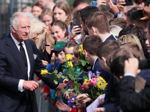 Press Eye - Belfast - Northern Ireland -  13th September 2022Members of the public, local school children and Connie the Corgi meet King Charles at Hillsborough Castle.His Majesty The King and Her Majesty The Queen Consort arrive in Northern Ireland as part of Their Majesties' wider programme of visits across the regions of the UK.  The King and Consort arrive at Hillsborough Castle, where they meet with the public and viewed floral tributes left for Queen Elizabeth II before His Majesty held a private audience with the Secretary of State for Northern Ireland and meet with representatives from political parties. Their Majesties also received a Message of Condolence from The Speaker of Assembly Alex Maskey.  Picture by Jonathan Porter/PressEye