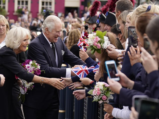King Charles III and the Queen Consort meeting wellwishers outside Hillsborough Castle, Co Down, following the death of Queen Elizabeth II on Thursday. Picture date: Tuesday September 13, 2022.