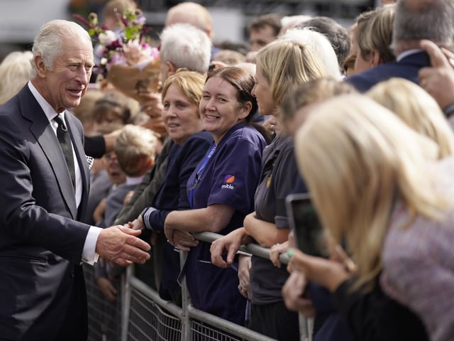 King Charles III meeting wellwishers as he arrives for a visit to Hillsborough Castle, Co Down, following the death Queen Elizabeth II on Thursday. Picture date: Tuesday September 13, 2022.