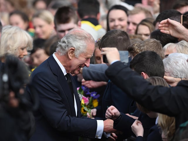 King Charles III and the Queen Consort greet members of the puplic as they arrive at Hillsborough Castle, Co Down. Picture date: Tuesday September 13, 2022.
