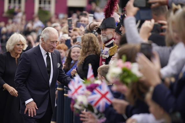 King Charles III and the Queen Consort meeting wellwishers outside Hillsborough Castle, Co Down, following the death of Queen Elizabeth II on Thursday. Picture date: Tuesday September 13, 2022.