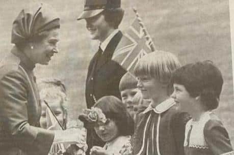 Local woman Heather Patton remembers meeting the Queen during her visit to Hillsborough in 1977. She has treasured the photograph which appeared in the Star.