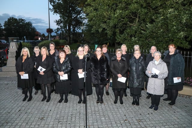 The Military Wives Choir led the singing at the Act of Remembrance. Pic by Norman Briggs, rnbphotographyni