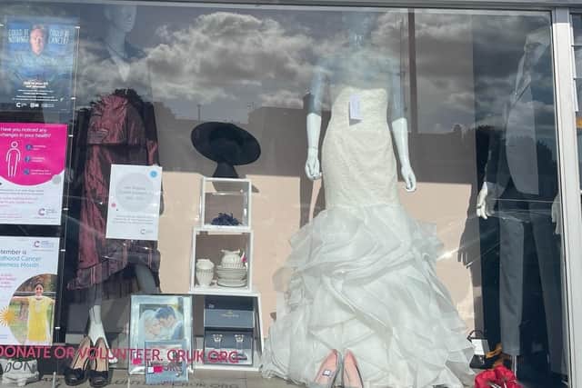 The Cancer Research shop at Smithfield Street in Lisburn which is selling brand new wedding dresses at a discounted price