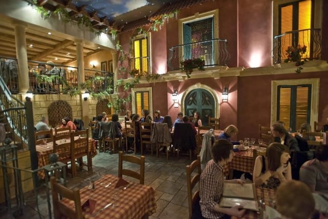 This University Road Italian restaurant aims to make you feel good - offering a menu with handmade stone-baked pizzas, authentic Italian pastas and locally sourced meats and fish. Visitors can enjoy the the rustic Italian charm of the interiors; picturesque murals, hanging grapevines, and the aroma of fresh garlic.