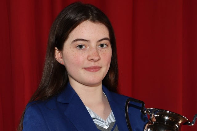 Maeve Lalsingh with the MacAllister McAleese Cup for Outstanding Achievement at GCSE