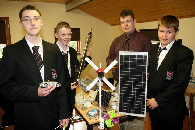 Philip McCallon, Corey Price and Bret Wilson, from Cullybackey High School, with Adrian McLaughlin (Post Primary Education Officer, Action Renewables) during a science workshop at the Ecos Centre. BT43-239AC