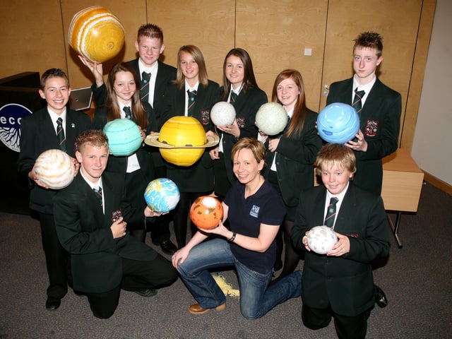 Wendy McCorry (Education Officer from the Armagh Planetarium) with pupils from Cambridge House during her science workshop "Our Fragile Planet" at the Ecos Centre. BT43-240AC
