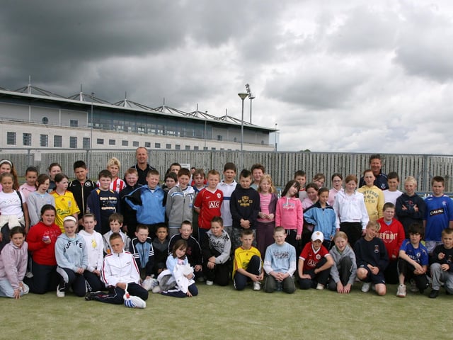 Pupils from Braidside Integrated Primary School and Hazlewood Integrated Primary School Belfast, who took part in a football fun day at Ballymena Showgrounds and the Ecos Centre, which is organised as part of the Ballymena United Football in the Community Scheme, with Ballymena United manager Tommy Wright and Coaches Jim Hagan and Geoff Montgomery. BT20170CS