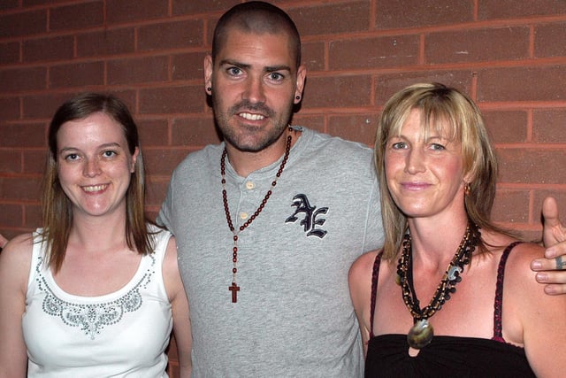 Boy band star Shane Lynch pictured on Friday night at the Seven Towers Leisure Centre with fans Leanne Harkness and Ruth McCrorry before he did his bit at the Green Pastures Church special evening of praise. BTFR24-604h