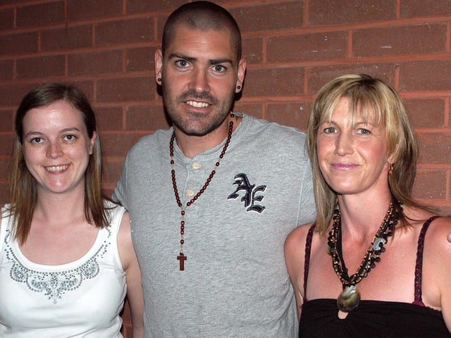 Boy band star Shane Lynch pictured on Friday night at the Seven Towers Leisure Centre with fans Leanne Harkness and Ruth McCrorry before he did his bit at the Green Pastures Church special evening of praise. BTFR24-604h