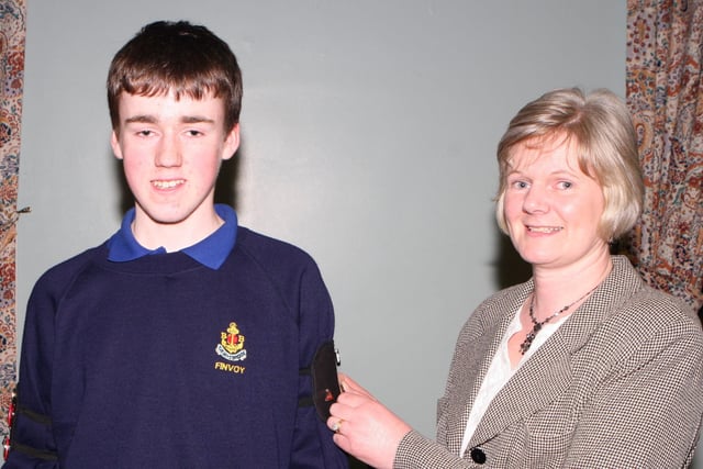 William Beattie receives his Presidents Badge from Mum Jennifer at Finvoy BB Display in March 2007