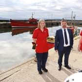 The Minister with island nurses Kiera McKillop and Jackie Devine