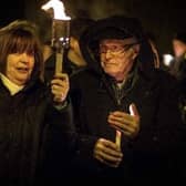 John McAnespie with his daughter Margo during a vigil for his son Aiden.