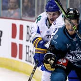 Belfast Giants' Mark Cooper with Fife Flyers' Brayden Sherbinin during last Saturday's Challenge Cup game at the SSE Arena, Belfast. Picture by William Cherry/Presseye