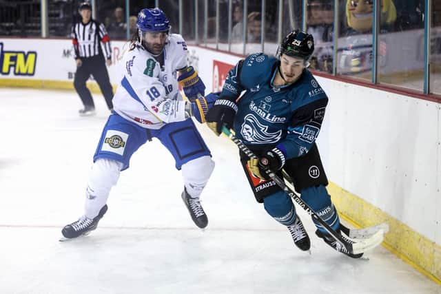 Belfast Giants' Colby McAuley with Fife Flyers' Chris Lawerence during last Saturday's Challenge Cup game at the SSE Arena, Belfast. Picture by William Cherry/Presseye