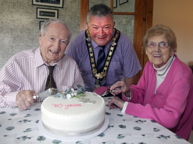 Alex and Agnes McElreavey who celebrated their 70th wedding anniversary on September 10 pictured with the Mayor of Causeway Coast and Glens Borough Council, Councillor Ivor Wallace