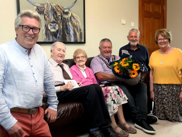 Alex and Agnes McElreavey who celebrated their 70th wedding anniversary on September 10 pictured with the Mayor of Causeway Coast and Glens Borough Council, Councillor Ivor Wallace, and their three children, Valerie, John and Kenneth