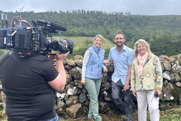 American TV presenter Samantha Brown with stone mason Nathan Morrow; and Ruth Moran, Tourism Ireland, during filming at Glenarm Castle for her award-winning travel programme, Places to Love, whch will be shown to millions of people across the USA during prime time on PBS (Public Broadcasting Service).