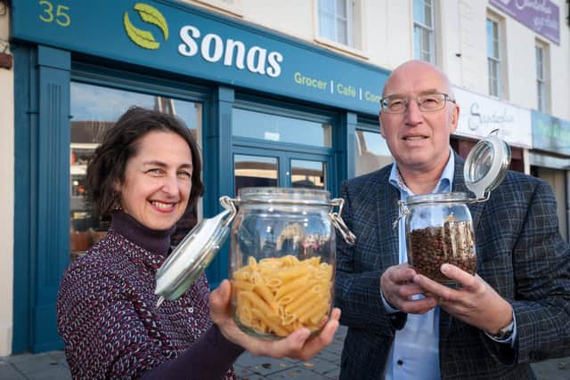 SONAS co-founder Julie Hoey welcomes Councillor John Laverty BEM, Chair of Regeneration and Growth to the new store in Market Square. Pic credit: Matt Mackey