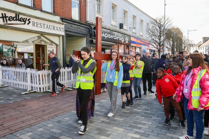 Representatives from local churches helped to carry a cross through Lisburn City Centre for the annual walk of witness