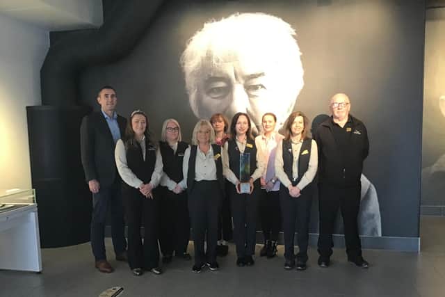 Staff at Seamus Heaney Homeplace in Bellaghy with the trophy they received for winning the coveted Most Innovative Large Tourism Business Award
in Northern Ireland.