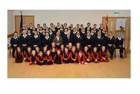 267th Girls Brigade Company (Finvoy) with Captain Donna McLester, Chaplain Rev. Roy Gaston and Company President Mabel Campbell.