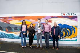 Kilrea's Fairhill is looking colourful thanks a new mural funded by the Fairy Thorn's Participatory Budget project and Donaghy Bros sponsorship.  Mayor of Causeway Coast & Glens Borough Council, Ciaran McQuillan, was on hand this week to launch the Fairy Thorn Festival for 2024 with representatives from the four main sponsors of the weekend-long event - from left to right: Ann Marie Brizzell, KRD Credit Union' Lisa McErlean, Hutchinson Engineering; James Donaghy, Donaghy Bros; Barney Kelly, Europa Foods. CREDIT KILREA FAIRY THORN