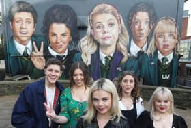 Derry Girls creator Lisa McGee, second from left, with cast members Dylan Llewellyn , Saoirse-Monica Jackson, Louisa Harland and Nicola Coughlan pictured at the 'Derry Girls' mural. Picture: Lorcan Doherty / Press Eye