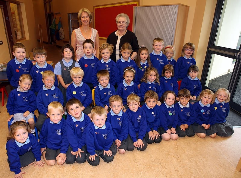 Downshire Primary School P1W class pictured in 2007 with teacher Mrs Heather Wylie and Mrs Paddy Simpson