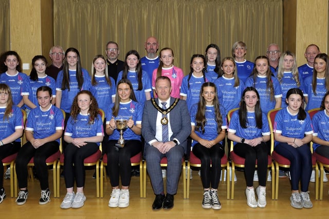 Lord Mayor, Cllr Paul Greenfield hosted a reception in Craigavon Civic Centre for Clan Na Gael Junior and Minor teams to celebrate their successes. Pictured are the U14 team winners of the U14 Division League, with their coaches, along with Councillors Eamon McNeill, Kevin Savage and Liam Mackle.