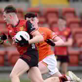 Caolan Flanagan drives his way past Armagh's Jarlath O'Neill when the Minor sides played in March.