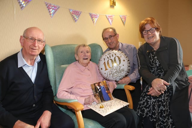 Gertrude Mullan celebrating alongside her family.