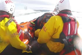 RNLI volunteers responding to reports of a person in the water at Portmuck.  Photo submitted by the RNLI