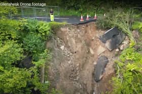 The road has been closed between the junctions of Glenbank Road and Greenan Road since 27 March 2024, due to a partial road collapse resulting from a landslide. CREDIT DFI
