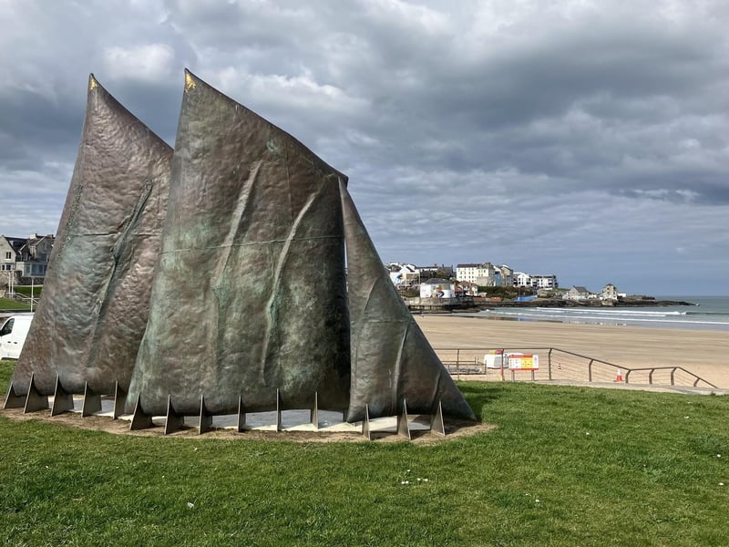 Portrush's East Strand is home to this fabulous sculpture. Opinions differ as to what the public art piece actually represents but I love it! For me, I see the fins of the porpoises and dolphins which regularly pop up in the seas off Portrush's peninsula. The colour and texture of the sculpture also reminds me of the basalt stone which is so prevalent in this area and is used in so many of the older buildings in the town such as St Patrick's Catholic Church and neighbouring primary school and Holy Trinity Parish Church.