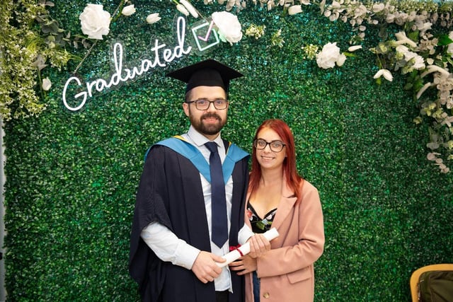 South West College (SWC) Omagh campus graduate Cathal Morrow from Dungannon, with his partner celebrating his achievements on the Open University BSc (Hons) in Construction Engineering and Management.