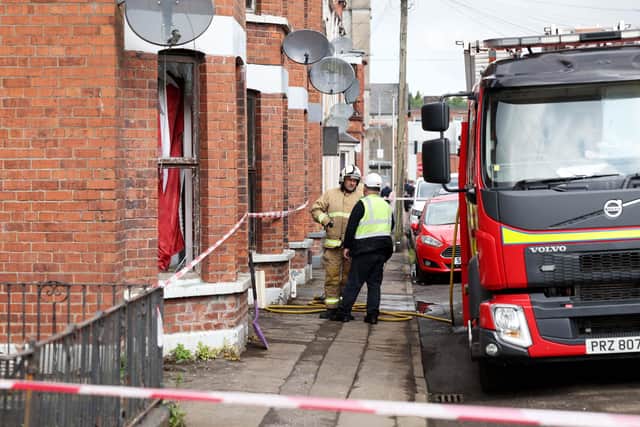 Firefighters remain at Clonavon Terrace in  Ballymena.  Picture by  Jonathan Porter  / Press Eye