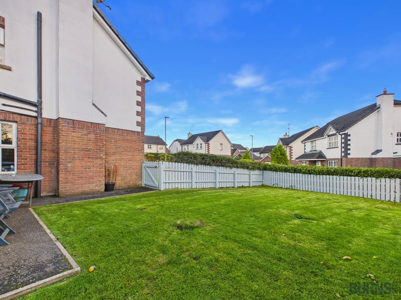 Front and side garden in lawn.